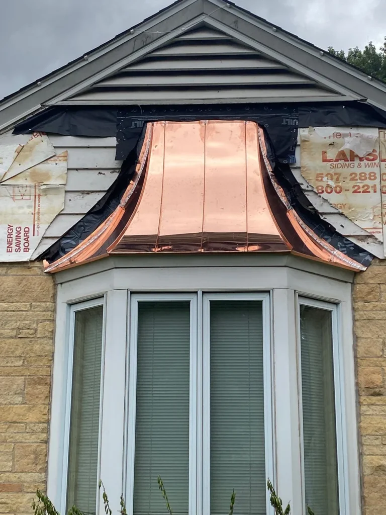 Sheridan Sheet Metal Co. - Tall Copper Concave Window Bay Roof