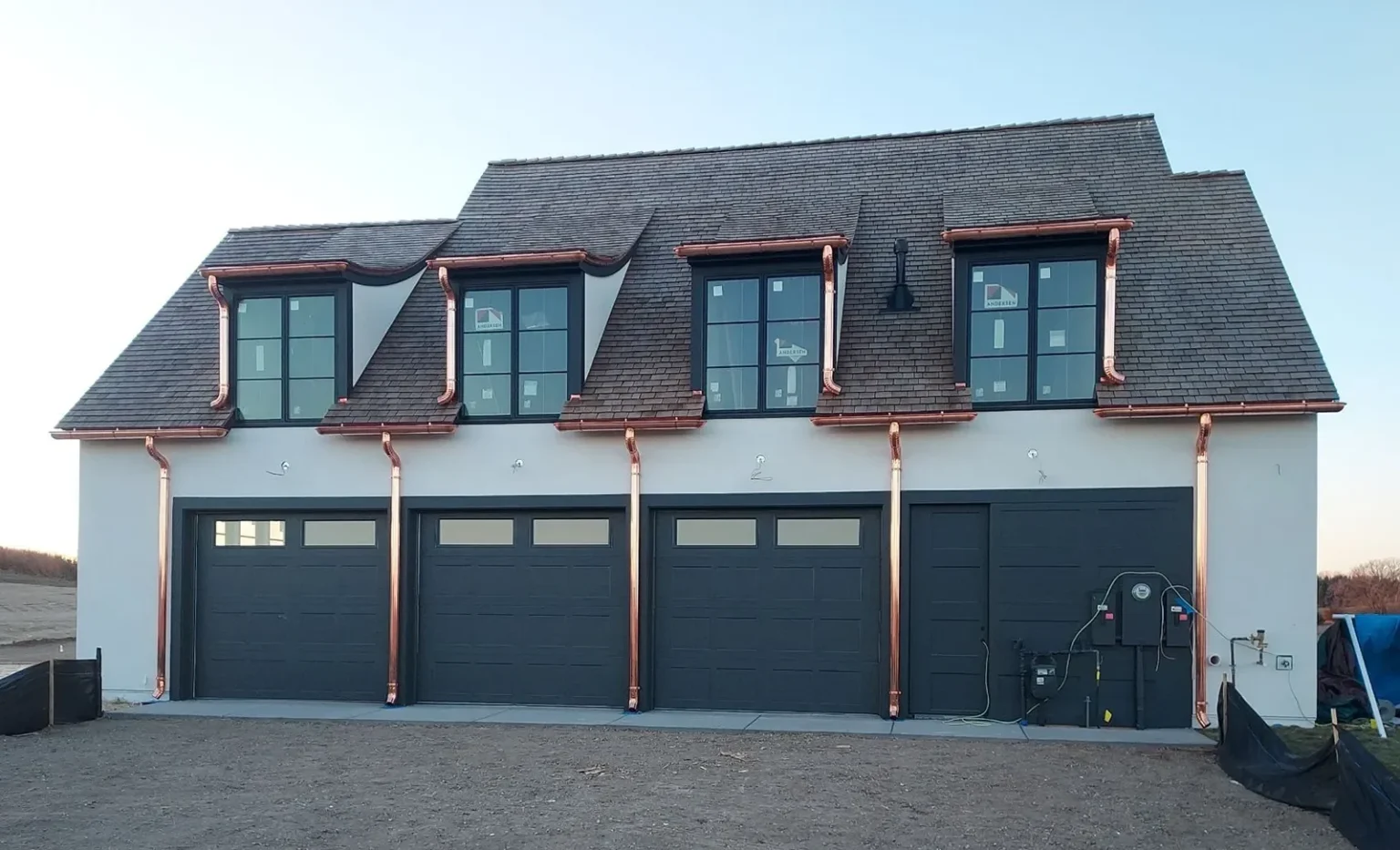 copper residential gutters and downspouts by Sheridan Sheet Metal Co.